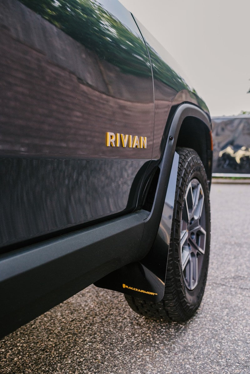 RAL UR Black Flap/Tang Logo - Rally Armor 22-25 Rivian R1T Black UR Mud Flap w/Tangerine Scream Logo